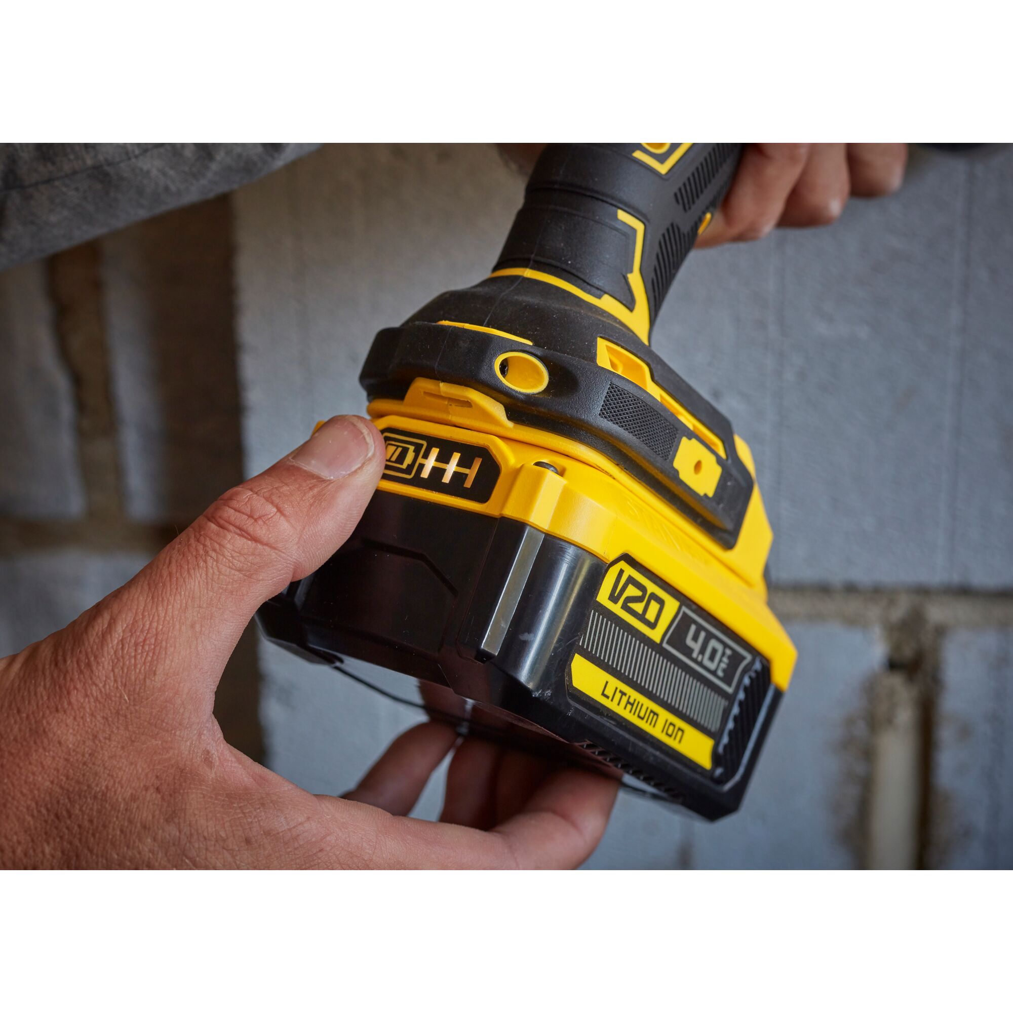 DeWalt SKU SB204-KR cordless tool close-up showing V20 4.0Ah lithium-ion battery in use.