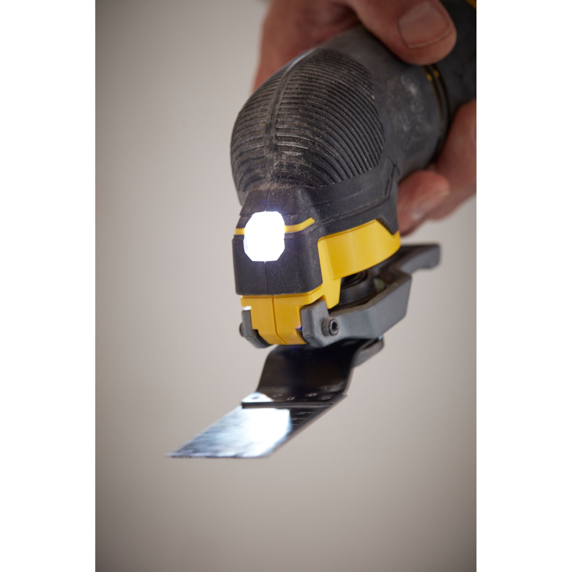 STANLEY SCT500D2K oscillating tool with LED light, close-up angle showing metal blade.