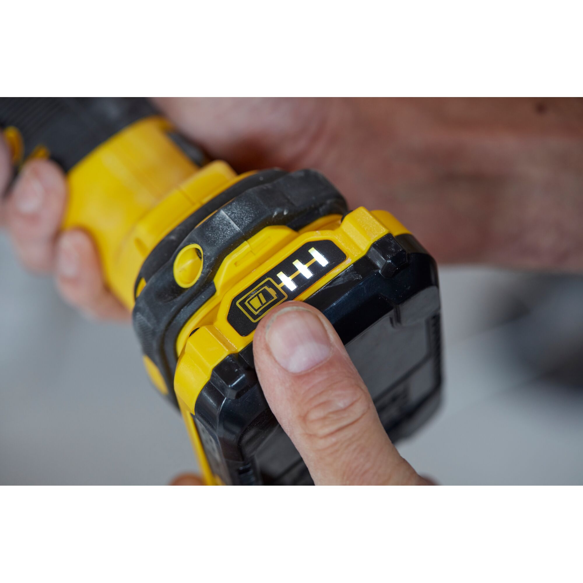 STANLEY SCT500D2K drill showing battery level indicator, close-up angle with yellow and black details.
