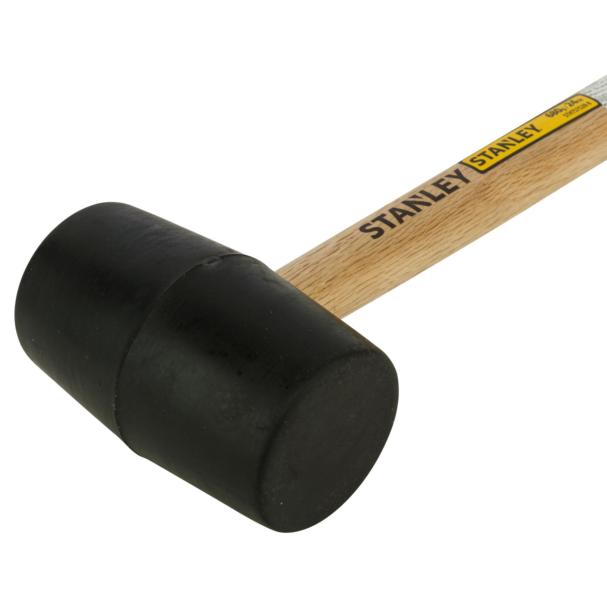 STANLEY STHT57528-8 rubber mallet with black head and wooden handle, angled side view on white background.