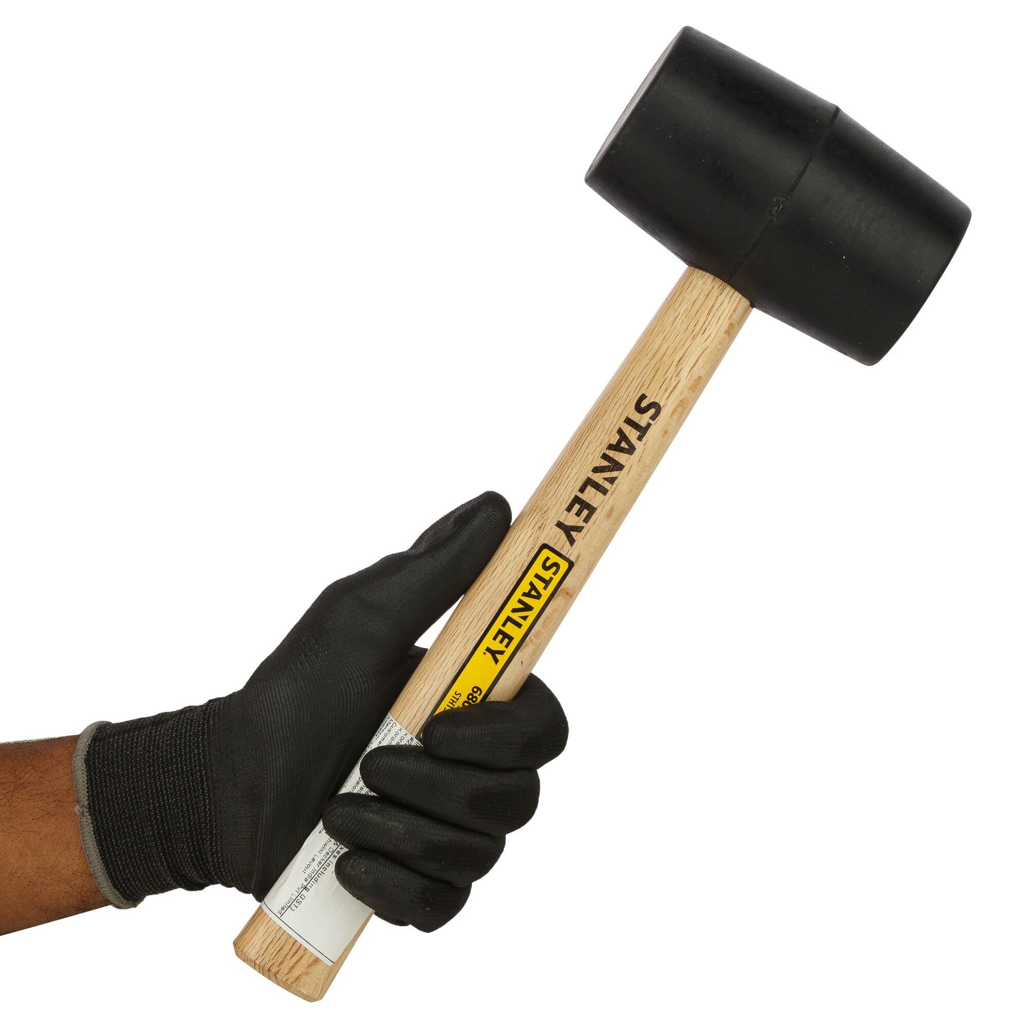 Photo of STANLEY STHT57528-8 rubber mallet with wooden handle, held by a gloved hand, side angle.