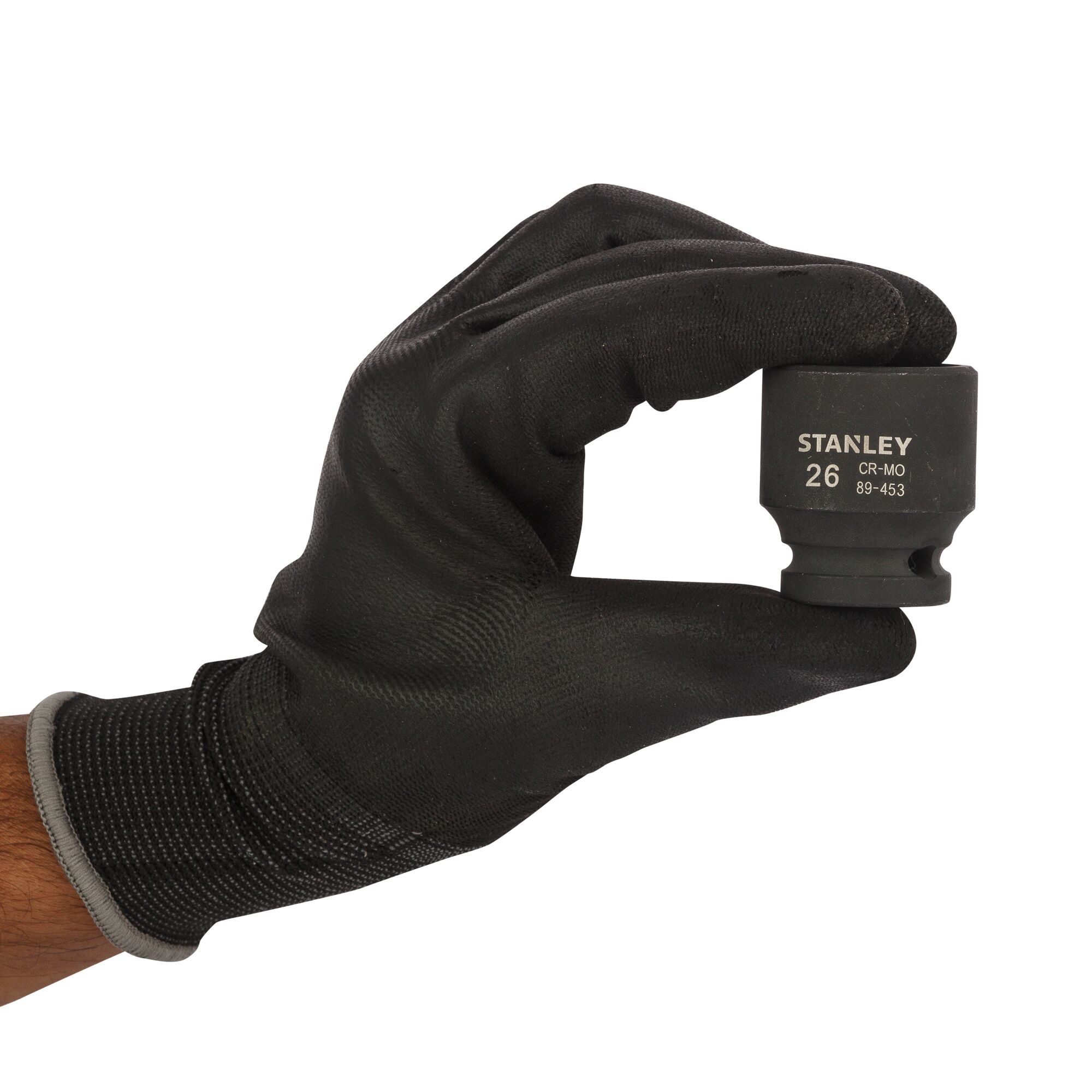 Photo of STANLEY STMT89453-8B socket held by a gloved hand, front view on white background.
